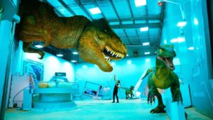 A futuristic exhibit featuring life-sized dinosaur models in action.